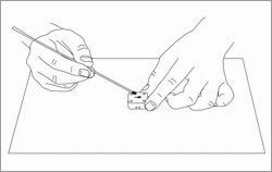 カーボンペーストを電極の孔に固く充填する